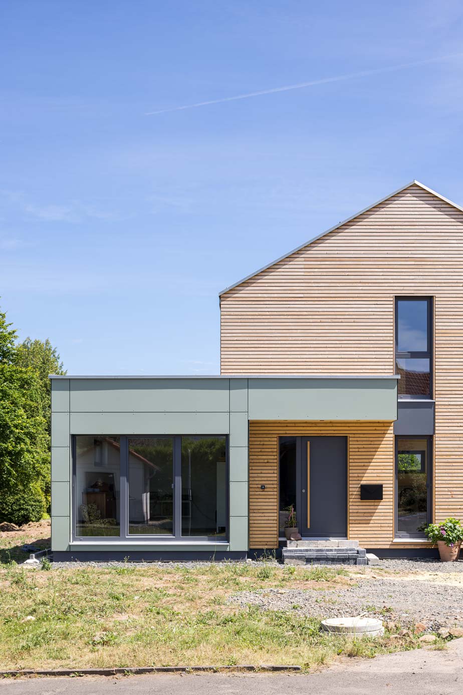 Holzhaus mit Rhombusfassade